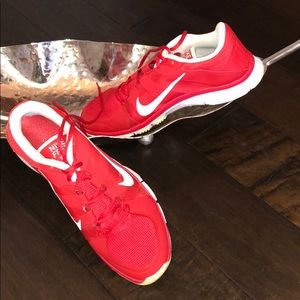 Men’s red Nike tennis shoes